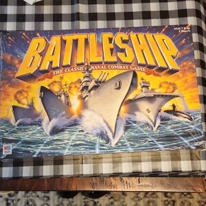 Battleship The Classic Naval Combat Game 2002 edition never opened.